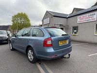 Usado Skoda Octavia SE 105 HP (77 kW) 2012 Cinzento Carrinha