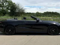 Used Mercedes E220 AMG Line Premium 194 HP (142 kW) 2021 Black Cabriolet