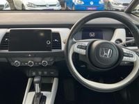 Used Honda Jazz Hybrid 109 HP (80 kW) 2023 Premium paint  shining grey Hatchback