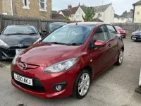 Używany Mazda 2 86 KM (63 kW) 2010 Czerwony Hatchback