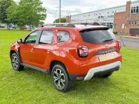 Used Dacia Duster Prestige 90 HP (66 kW) 2023 Orange SUV
