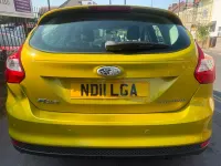 Used Ford Focus Titanium 125 HP (91 kW) 2011 Yellow Hatchback