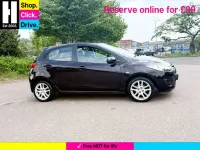 Usado Mazda 2 84 HP (61 kW) 2011 Castanho Citadino