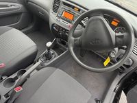 Used Kia Rio 95 HP (69 kW) 2009 Black Hatchback