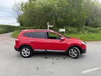 Używany Nissan Qashqai +2 N-TEC 110 KM (80 kW) 2011 Czerwony SUV