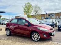 Używany Mazda 2 84 KM (61 kW) 2011 Czerwony Hatchback