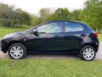 Używany Mazda 2 75 KM (55 kW) 2012 Czarny Hatchback