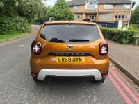 Used Dacia Duster 115 HP (84 kW) 2018 Orange SUV