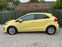 Used Kia Rio 2015 Yellow Hatchback