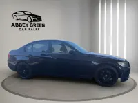 Begagnad BMW 318 2007 Blå Sedan