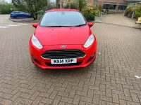 Używany Ford Fiesta Titanium 105 KM (77 kW) 2014 Czerwony Hatchback