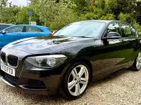 Begagnad BMW 120 M Sport 2013 Svart Halvkombi