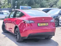 Used Tesla Model Y Long Range AWD 378 kW (514 HP) 2022 Red SUV