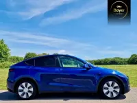 Begagnad Tesla Model Y Long Range AWD 85 kW (116 HK) 2022 Blå SUV