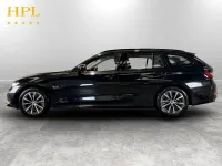 Used BMW 330e Sport Line 292 HP (214 kW) 2023 Black Estate