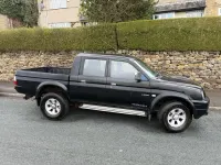 Usado Mitsubishi L200 113 CV (83 kW) 2006 Negro Pickup/Camioneta