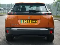 Gebraucht Peugeot e-2008 Active Premium 100 kW (136 PS) 2022 Orange SUV