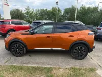Second-hand Peugeot e-2008 Premium 98 kW (134 CP) 2022 Portocaliu SUV