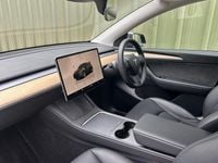 Używany Tesla Model Y 282 kW (384 KM) 2022 Szary SUV