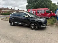 Used Renault Captur Dynamique 90 HP (66 kW) 2013 Black/cream SUV
