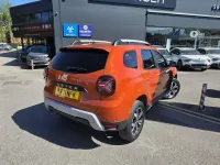 Second-hand Dacia Duster Prestige 113 CP (83 kW) 2021 Portocaliu SUV