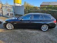 Used BMW 520 181 HP (133 kW) 2012 Black sapphire metallic Estate