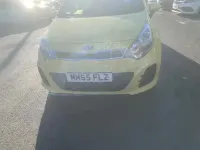 Used Kia Rio 2015 Yellow Hatchback