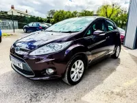Usado Ford Fiesta Zetec 82 HP (60 kW) 2008 Vermelho Citadino