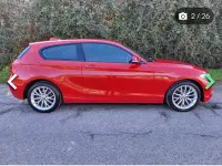 Begagnad BMW 120 Sport Line 177 HK (130 kW) 2015 Röd Halvkombi
