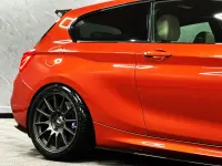 Used BMW M140 M Sport 471 HP (346 kW) 2016 Orange Hatchback
