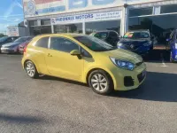 Used Kia Rio 2015 Yellow Hatchback