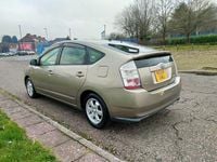 Used Toyota Prius T3 76 HP (55 kW) 2018 Brown/gold Hatchback