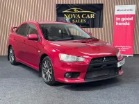 Used Mitsubishi Lancer 240 HP (176 kW) 2011 Red Sedan