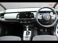 Used Honda Jazz Hybrid 109 HP (80 kW) 2023 Premium sunlight white Hatchback