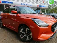 Used Suzuki Swift 82 HP (60 kW) 2026 Flame orange pearl metallic Hatchback