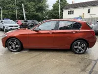Used BMW 118 Sport Line 136 HP (100 kW) 2017 Sunset orange metallic paint Hatchback