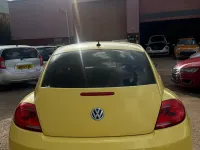 Used VW Beetle 105 HP (77 kW) 2013 Yellow Hatchback