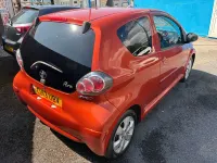Used Toyota Aygo 68 HP (50 kW) 2013 Orange Hatchback