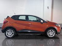 Used Renault Captur Dynamique 90 HP (66 kW) 2014 Orange/cream SUV