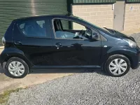 Usado Toyota Aygo 68 CV (50 kW) 2012 Negro Utilitario