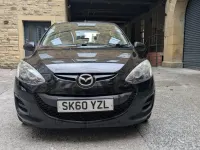 Begagnad Mazda 2 2010 Svart Halvkombi
