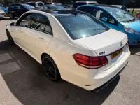 Used Mercedes E63 AMG AMG 550 HP (404 kW) 2013 Pearl white Sedan