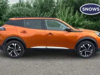 Second-hand Peugeot e-2008 Allure Premium 100 kW (136 CP) 2022 Portocaliu SUV