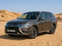 Używany Mitsubishi Outlander P-HEV 200 KM (147 kW) 2016 Brązowy SUV