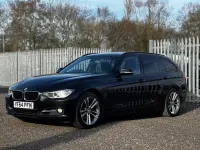 Usado BMW 320 Sport Line 2014 Negro Familiar