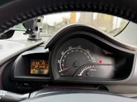 Used Toyota iQ 68 HP (50 kW) 2010 Silver Hatchback