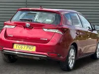 Used Toyota Auris Hybrid Business Edition 136 HP (100 kW) 2017 Red Hatchback