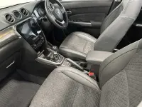 Used Suzuki Vitara 129 HP (94 kW) 2024 Bright red/ black roof SUV
