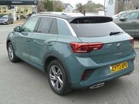 Used VW T-Roc R-line 150 HP (110 kW) 2023 Petrol blue black roof SUV