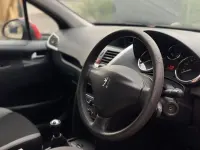 Begagnad Peugeot 207 2009 Röd Halvkombi